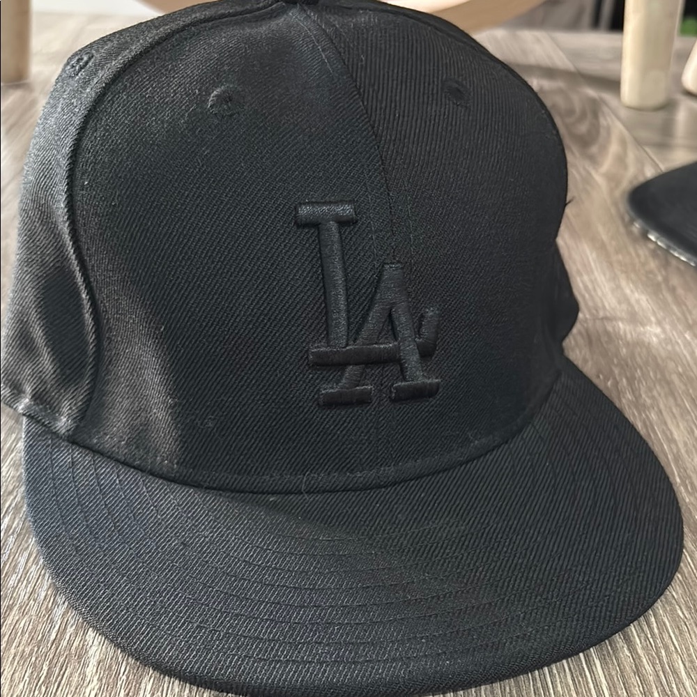 Genuine Merchandise Black Cap with Logo